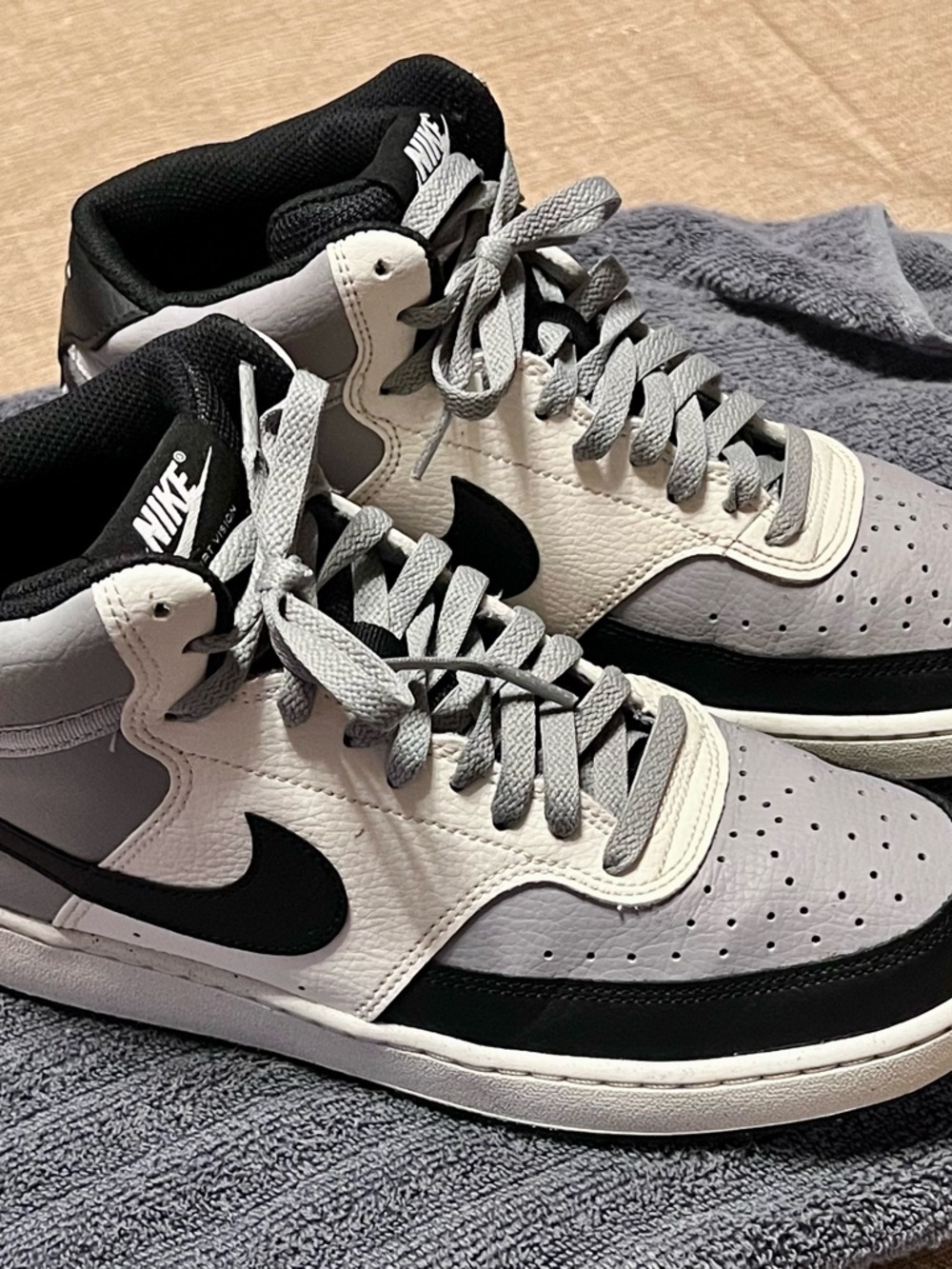 Nike Men’s Court Vision Mid-cut Sneakers in White, Black, Gray